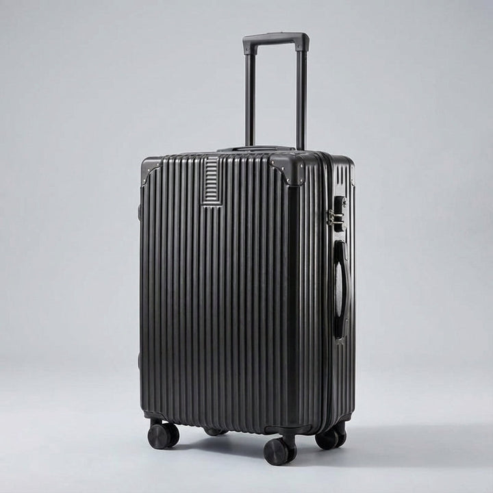 Pojemna walizka podróżna retro Casevo z wytrzymałymi kółkami i ergonomiczną rączką.