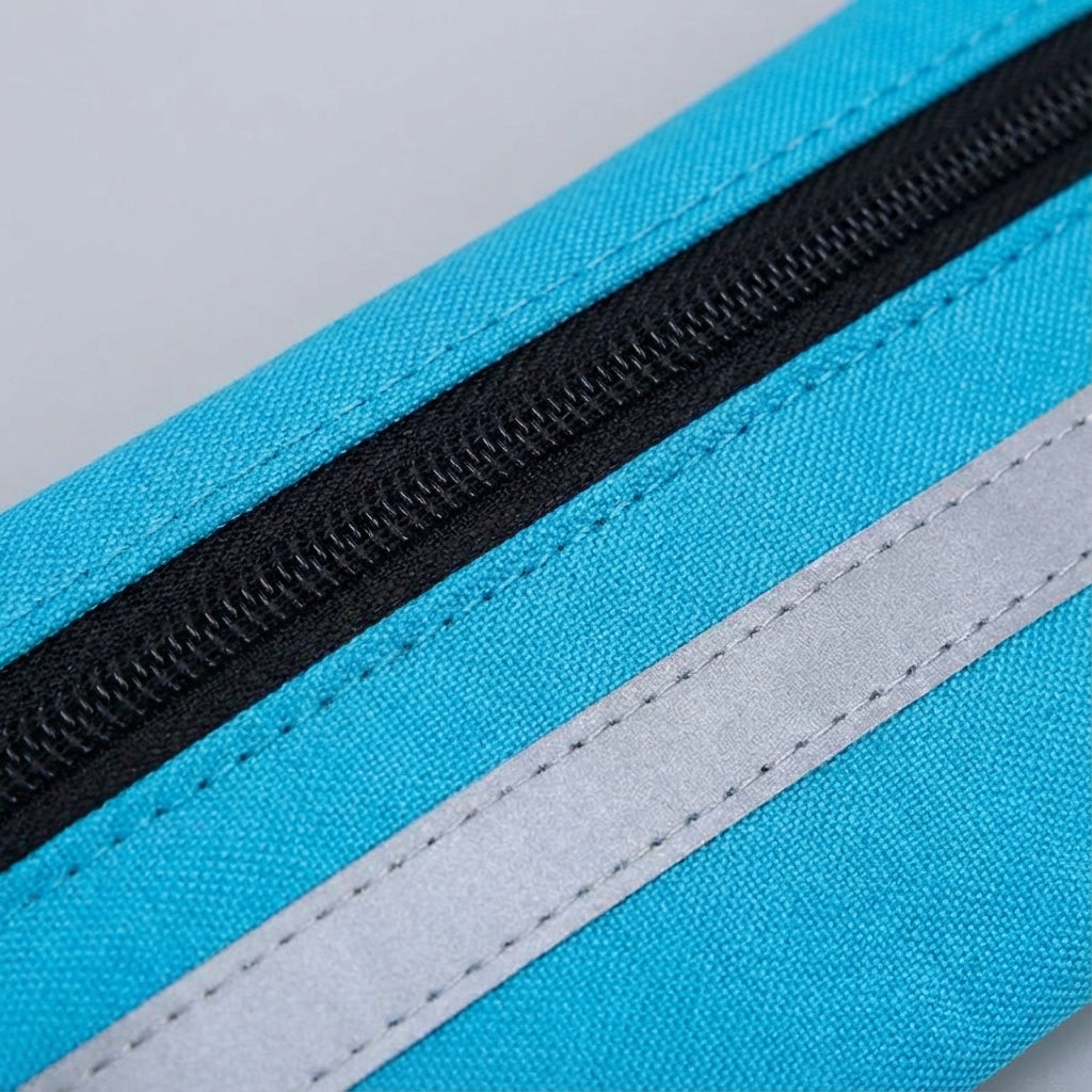 Lekka, wygodna nerka sportowa RunBelt dla biegaczy. Wodoodporna, unisex, doskonała na aktywny trening i fitness.