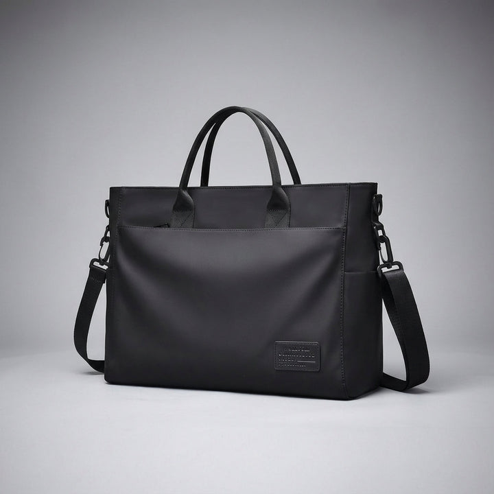 Stylowa torba na ramię crossbody DryCarrier, wodoodporna, z miejscem na laptopa i dokumenty. Nowoczesny design unisex.