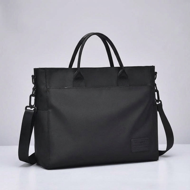 Ochronna torba na laptopa DryCarrier, wodoodporna i wytrzymała. Unisex, idealna do pracy i bezpiecznego transportu.