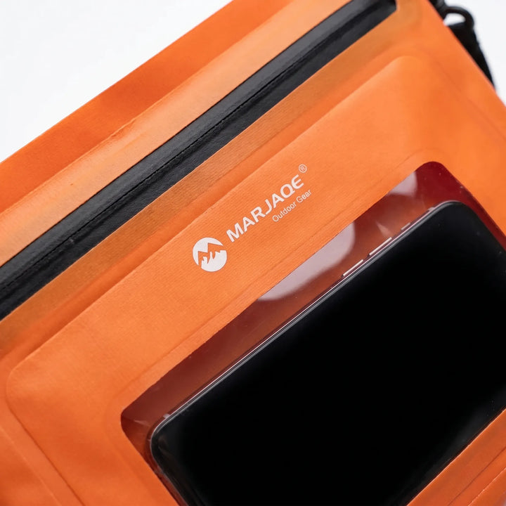 Solidna wodoodporna torba crossbody na ramię, chroniąca telefon podczas aktywności outdoorowych.